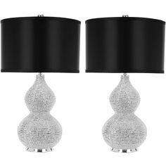 two lamps with black shades on them