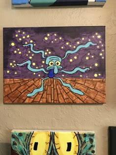 two paintings are hanging on the wall next to each other, one has an octopus in it's mouth