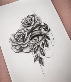 a drawing of a rose with an eye on it