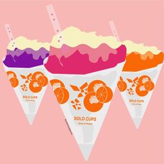 three ice cream cones with oranges and pink icing on them, all in different flavors