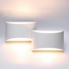 two white lights that are next to each other