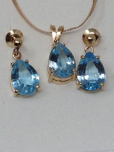 "Vintage Estate 14Kt Topaz Pendant , Chain and Earring Set. Chain is approx 17 3/4 inches long. PROFESSIONAL INSURANCE APPRAISAL of $1600.00 This set has been professionally appraised and that written appraisal will accompany the set when sold. Since I am not an expert regarding this item, I have relied on the expertise of the certified professional appraisal. The following details about this pendant, chain and earrings are from a Certified Gemmologist-Certified Gold Smith appraisal: \" A 14 kar Teardrop Topaz Yellow Gold Jewelry, Yellow Gold Topaz Teardrop Jewelry, Gold Jewelry With Diamond-cut Blue Topaz, Gold Blue Topaz Jewelry With Diamond Cut, Fine Jewelry Blue Topaz In Pear-shaped, Fine Jewelry Blue Topaz Pear-shaped, Drop-shaped Topaz Jewelry For Anniversary, Drop Shape Topaz Jewelry For Anniversary, Drop Shaped Topaz Jewelry For Anniversary