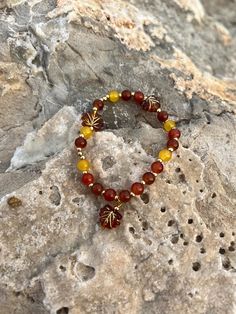 Glass bead bracelet with different different bead sizes.With fall leaves. Tied together with nylon tread. Bead Sizes, Glass Bead Bracelet, Glass Beaded Bracelets, Fall Leaves, Bead Bracelet, Glass Bead, Pearl Bracelet, Autumn Leaves, Sweden