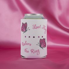 a can cooler with pink butterflies on it that says, last fling before the ring