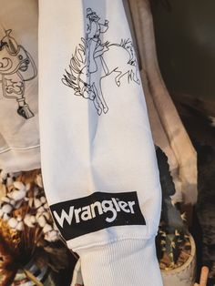 Wrangler Retro Women's Cream with Black Sketch Western Print Long Sleeve Sweatshirt 80% Cotton / 20% Polyester Crewneck Designs, Modesty Journey, Western Hoodies, List Inspiration, Black Sketch, Cowgirl Pictures, Western Sweatshirts, Presents Ideas, Macbook Air Cover