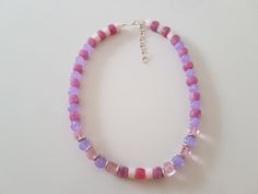 Purple necklace, purple necklace, pink necklace of glass beads of different shapes: cubes, rounds, cylinders; pink transparent beads, metal pieces, gift for her, handicraft, handmade gift for women Length 46 cm (18.11 inches).  It can be extended up to 7 cm (2.76 inches). Necklace is ready to ship. You can choose unique handmade gifts for women from my stores https://www.etsy.com/shop/Reriros and https://www.etsy.com/shop/ReriroHandmade All my items are hand made in a smoke-free and pet-free home environment. Please note that due to differences in monitor settings, object and photo color may vary slightly. Your purchase will be sent within 1 to 2 days after receipt of payment. The exceptions are only for weekends and holidays. I will confirm the shipment of your order by e-mail. If you wan Pink Single Strand Glass Necklace, Pink Glass Necklace With Colorful Beads, Pink Czech Glass Necklaces With Colorful Beads, Purple Czech Glass Necklaces With Colorful Beads, Purple Beaded Necklace With Letter Beads As Gift, Pink Czech Glass Necklaces With Faceted Beads, Purple Czech Glass Beaded Necklaces, Purple Czech Glass Necklace With Colorful Beads, Pink Glass Necklace With Round Beads