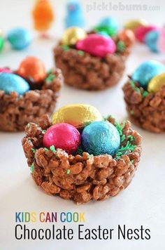 chocolate easter nests with candy eggs in them on a white surface and text overlay reads kids can cook chocolate easter nests