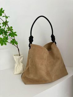 Color: Beige & Coffee Material: Suede Inclusions: dustbag DIMENSIONS: 28cm x 42cm x 10cm(11" x 16.5" x 4") This stunning suede leather tote bag is your perfect companion for any occasion! Whether you're heading to work, traveling, or just out for a stylish day, this handbag effortlessly adds a touch of elegance to your look. Its spacious interior can hold all your essentials, while the soft suede feels luxurious. The shoulder strap ensures comfortable wear, and the knotted handle design adds a c Camel Tote Bag For Errands, Large Capacity Camel Shoulder Bag, Camel Rectangular Hobo Bag With Large Capacity, Brown Hobo Shoulder Bag For Shopping, Camel Tote Shoulder Bag For Errands, Camel Shoulder Bag With Leather Handles, Camel Shoulder Bag With Handles For Everyday Use, Camel Leather Bag For Errands, Rectangular Camel Bag For Errands