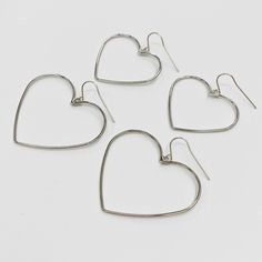 Spread some love with the Smooth Heart Earrings. These earrings feature 18K plated gold on 14k gold-filled hooks, or sterling silver hooks. Making them not only cute but also high-quality. Plus, they're nickel free for sensitive ears. Show off your playful and quirky style with these unique earrings! Quirky Style, Flat Heel Boots, Cut Clothes, Beanie Style, Heel Slippers, Backpacking Packing, Swim Accessories, Active Wear Leggings, Skirt Leggings