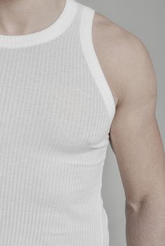 "OFF-WHITE SPORTY RIBBED LONG TANK TOP model__ chest 103 (40.5\"), waist 77 (30.3\"), hips 96 (37.8\"), biceps 35 (13.8''), height 180 (5'11\"), kg 74 (163 lbs) model wears size M | color: off white fabric__ 92 cotton, 08 elastane care__ delicate machine wash at 30 c wash inside out use cool iron do not tumble dry sizing__ size XS (IT 44, US 34, JP 1) chest 92 - 95 cm / 36\" - 37.4\" waist 74 cm / 29.1\" hips 92 cm / 36\" biceps 30 cm / 11.8\" size S (IT 46, US 36, JP 2) chest 96 - 99 cm / 37.8\ White Fitted Lace Tank Top, Fitted White Lace Tank Top, White Fitted Crochet Tank Top, White Sleeveless Gym Top, White Fitted Racerback Tank Top, White Stretch Tank Vest, Fitted White Vest Top, White Sleeveless Vest Top, White Tank Top For Gym