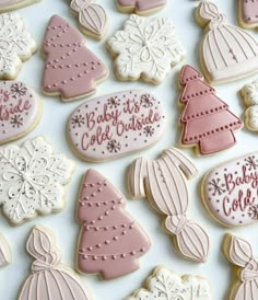 decorated cookies are displayed on a white surface