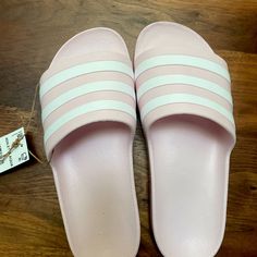 Adidas Adilette Slides Pink And White Size 9 New In Box With Tags (*Open To Offers*). I Got These From Adidas But Got The Wrong Size And Was Too Lazy To Return And It’s Too Late Now So Feel Free To Send Offers. Pink Adidas Slides, Comfortable Adidas Slip-on Slides, Adidas Non-slip Slides With Round Toe, Sporty Pink Non-slip Slides, Adidas Non-slip Beach Slides, Adidas Slides, Adidas Adilette, Pink Adidas, Adidas Shoes