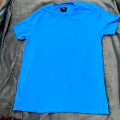 Never Worn Zara Short Sleeve Men’s T-Shirt In Xl Slim Fit. This Is More Like A Large In Us Sizes. Pit To Pit 20” Across And Length Is 26” From Shoulder. Basic Blue Crew Neck Shirt, Basic Blue Short Sleeve Shirt, Blue Plain Short Sleeve Shirt, Light Blue Pre-shrunk Short Sleeve T-shirt, Blue Short Sleeve T-shirt By Zara, Novelty Blue Pre-shrunk T-shirt, Blue Short Sleeve Zara T-shirt, Zara Blue Short Sleeve T-shirt, Cheap Turquoise Short Sleeve T-shirt