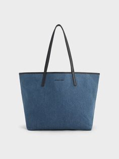 Denim Blue Sianna Denim Reversible Tote Bag | CHARLES & KEITH Reversible Tote Bag, More Than Meets The Eye, Denim Tote Bags, Reversible Tote, Blue Tote, Denim Tote, Size Chart For Kids, Charles Keith, Small Pouches