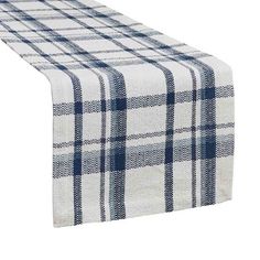 a white and blue plaid table runner