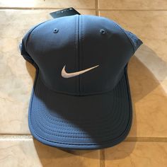 Nike Golf Hat Brand New O/S W/Tag Nike Breathable Baseball Cap, Sporty Six-panel Golf Hat, Sporty Golf Hat With Curved Brim, Nike Sports Hat With Curved Brim, Nike Breathable Hats For Sports Events, Breathable Hats For Golf, Nike Sports Hat With Flat Bill, Nike Baseball Cap For Sports, Nike Sports Fitted Baseball Cap