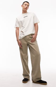 A baggy fit and a khaki wash bring relaxed, '90s-inspired style to these casual-cool nonstretch jeans. 30" inseam; 20 1/2" leg opening; 12" front rise; 16 1/2" back rise (size 32) Button fly Five-pocket style 100% cotton Machine wash, dry flat Imported