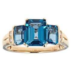 Stunning, timeless and classy eternity Unique Ring. Decorate yourself in luxury with this Gin & Grace Ring. The 10K Yellow Gold jewelry boasts Free Size (1 pcs) 2.03 carat Emerald-Cut, 6x4 mm (2 Pcs) 1.62 carat Emerald-cut Prong Setting London Blue Topaz, along with Natural Round-cut white Diamond (4 Pcs) 0.03 Carat accent stones for a lovely design. This Ring is weight 2.15 grams. Crafted with 10K Yellow Gold, this delicate Ring is polished to a high finish shine. Luxury Emerald Cut Topaz Ring With Diamond Accents, Luxury Rectangular Yellow Gold Sapphire Ring, Luxury Polished Finish Topaz Ring, Gin And, Yellow Gold Jewelry, Unique Ring, Delicate Rings, Yellow Gold Ring, London Blue Topaz