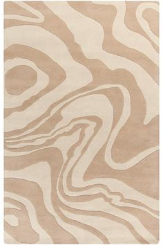 a beige rug with wavy lines on it