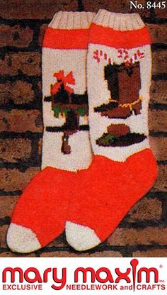 a pair of red and white socks with pictures on them