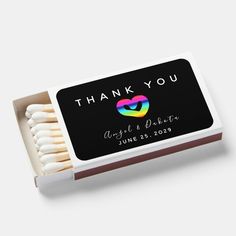 a matchbox with matches in it that says thank you