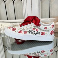 🌸 Step into your special celebration with style and grace, courtesy of our exquisite custom Vans shoes. These sneakers have been artistically transformed to add a touch of elegance to your Sweet Sixteen or Quinceañera party, ensuring you stand out and make a statement on your big day. 🌸 Who says Vans can't be both chic and comfortable? We've redefined the rules! Our shoes are designed for dancing the night away without any discomfort. You can twirl and dance until dawn, feeling the rhythm in e Quinceanera Shoes Sneakers Red, Quince Nike Shoes, Customizable Lace-up Sneakers For Gift, White Lace-up Custom Sneakers For Gift, White Custom Lace-up Sneakers As Gift, White Lace-up Custom Sneakers As Gift, Customizable Lace-up Sneakers For Gifts, Custom Low-top Sneakers For Gift, Custom Low-top Sneakers As Gift