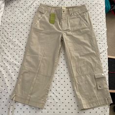 100% Cotton. Women’s Size 4 Capri Pants. Khaki Color. Never Worn With Tags Still On. 5 Pockets. New Condition. Knee-length Capris With Pockets, Spring Knee-length Pants With Pockets, Casual Knee-length Pants For Spring, Casual Knee-length Spring Pants, Spring Cropped Leg Capris With Pockets, Relaxed Fit Cotton Knee-length Capris, Relaxed Fit Knee-length Pants With Pockets, Spring Mid-rise Cotton Capris, Knee-length Relaxed Fit Pants With Pockets