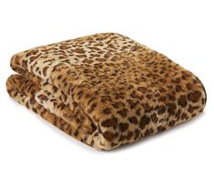 a leopard print blanket on top of a white background