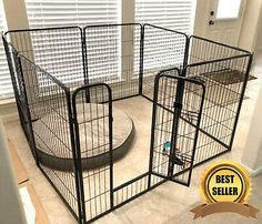 three metal cages in the middle of a room