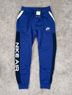 Brand New With Tags, Guaranteed Authentic, Check Out My 20,000+ Feedback. Size Small. Sporty Navy Bottoms For Leisure, Navy Cotton Sweatpants Sportswear, Nike Joggers With Pockets For Streetwear, Blue Cotton Sportswear Joggers, Blue Joggers For Leisure In Sportswear Style, Nike Winter Streetwear Sweatpants, Nike Sweatpants For Winter Streetwear, Navy Cotton Sportswear Joggers, Navy Cotton Joggers Sportswear