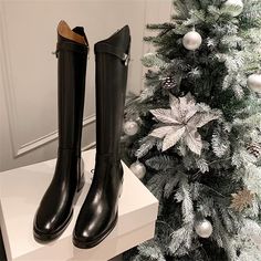 Experience the unmatched blend of style and comfort with these women's winter boots, exquisitely crafted from premium cow leather. The round-toe, slip-on design is accentuated by a modest 3.5cm heel, giving a sophisticated boost to your stride. The inhale of supple pigskin lining paired with robust rubber outsoles ensures durability without compromising on comfort. "Don't let winter cramp your style - step out in these luxe boots and make every pavement your runway. Thick Heel Boots, Black Flat Boots, Knight Boots, Boots Thick, Boots Flat, Low Heel Shoes, Boots High, Thick Heel, Winter Boots Women