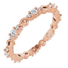 a rose gold wedding ring with diamonds