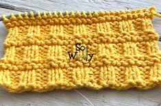 a yellow crochet stitch with the word, woolly written in black on it