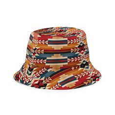 Inspired by the rich heritage of traditional Native American design textiles, our reversible bucket hat blends cultural motifs with contemporary style. Featuring a captivating Native American pattern on one side and serene blue on the other, this hat offers versatility and flair for every outing. Embrace the spirit of indigenous artistry with every wear, whether you're exploring the outdoors or simply soaking up the sun. This reversible bucket hat can be worn on both sides, making it easy to mat Reversible Multicolor Wide Brim Bucket Hat, Multicolor Reversible Wide Brim Bucket Hat, Bohemian Outdoor Bucket Hat With Curved Brim, Bohemian Bucket Hat With Curved Brim For Outdoor, Multicolor Reversible Hat With Curved Brim, Reversible Wide Brim Bucket Hat For Festivals, Bohemian Bucket Hat With Curved Brim, Adjustable Red Bohemian Bucket Hat, Bohemian Red Wide Brim Bucket Hat