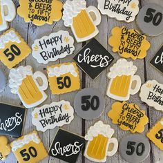 decorated birthday cookies with beer and cheers written on them for someone's 50th birthday