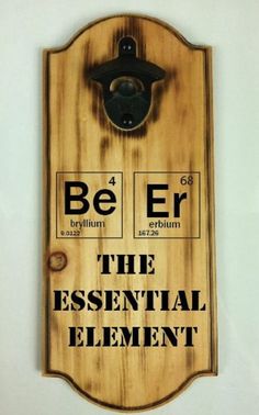 a wooden sign that says be er the essential element