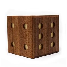 a wooden block with holes in it