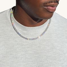 Introducing our Men’s Tennis Choker, crafted with a durable stainless steel base and adorned with high-quality simulated diamonds that boast an impressive sparkle. The 5mm width of each stone creates a bold yet sleek design, perfect for adding a touch of luxury to your everyday style. Whether you’re dressing up for a night out or elevating a casual look, this choker offers a striking balance of sophistication and edge. Built to last and resistant to tarnish, it’s a timeless piece that shines as Luxury Iced Out Round Tennis Necklace, Silver Crystal Tennis Necklace Iced Out, Silver Round Crystal Tennis Necklace, Luxury Silver Gemstone Tennis Necklace, Classic Silver Iced-out Tennis Necklace, Rope Chain Necklace, Gold Rope Chains, Tennis Necklace, Anklet Bracelet