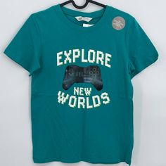 H&M Boys' Video Game Theme Bundle Of Two 10-12y T-Shirts Condition: New With Tag Size: 10-12y Color: Green/Teal 100% Cotton Crew Neck Short Sleeves Gamer/Video Game Theme And Graphics Machine Wash Please Feel Free To Ask Me Any Questions Regarding The Item Before Purchasing, Thank You! H&m Graphic Cotton T-shirt, H&m Short Sleeve Letter Print T-shirt, H&m Cotton T-shirt With Graphic Print, Green Cotton H&m Tops, Beatles Shirt, Boys Tshirt, Blue And White Striped Shirt, Tiger Shirt, Cropped Crewneck