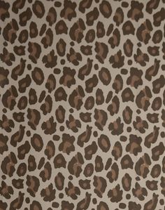 an animal print wallpaper with brown spots