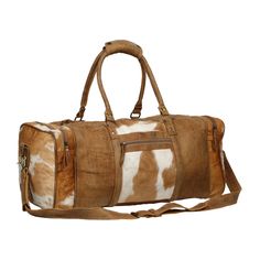 A striking concept for a travelling duffel bag that is constructed to carry the items you may need as well as a durable and stylish bag for a professional business trip, or a week long getaway. Full body covered in brown and white hair-on hide and light brown leather trim. Leather padded straps for added comfort. Importantly, this bag is engineered to be light for the traveller on the go. Materials Leather & HaironItem Width 24"Item Depth 10"Item Height 19"Handle 10"Shoulder 24" Note that the ex Cowhide Bag, Leather Travel Bag, Cow Skin, Leather Duffle, Leather Travel, Perfect Bag, Stylish Bag, Classic Leather, Travel Gear