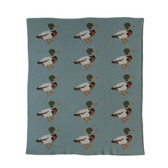 a blue towel with ducks on it