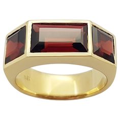 Garnet 5.26 carats Ring set in 18 Karat Gold Settings Width: 2.0 cm Length: 0.7 cm Ring Size: 53 Total Weight: 8.53 grams "We first opened doors in 1980 when it was then situated in the vicinity of the Victory Monument; a small and modest storefront with a couple of counters. From its humble beginnings to where it stands today, our company has proven its abilities as a jeweler. Since the beginning, we have been supplying fine quality pieces to dealers, wholesalers and customers worldwide. From t Formal Modernist 14k Gold Ring, Modernist 14k Gold Ring For Formal Occasions, Modern Formal Gemstones With Polished Finish, Modernist Yellow Gold Rings For Formal Occasions, Luxury Faceted Rings For Formal Occasions, Anniversary Rings With Polished Octagon Shape, Modernist 14k Gold Formal Ring, Classic Formal Gemstones With Polished Finish, Luxury Octagon Faceted Ring