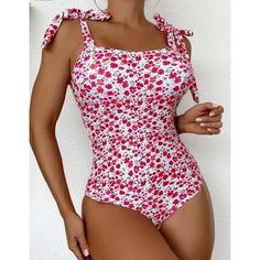 Introducing This Beautiful Pink Orange Women's One Piece Ditsy Floral Print Tie Side Boho Beachwear In Size Xl. The Garment Features A Stunning Floral Pattern That Is Perfect For The Bohemian Theme. It Is Made Of A Combination Of Polyester And Elastane, Making It Comfortable And Stretchy. The One Piece Is Machine Washable And Comes With Padded Features For Added Support. It Is Perfect For Women Who Want To Look Stylish And Feel Comfortable While At The Beach. This Item Is A Great Addition To Any Fitted Casual Floral Print Swimwear, Casual Pink Swimwear For Vacation, Casual Pink Swimwear For Summer, Casual Pink Summer Swimwear, Pink Cotton Swimwear For The Pool, White Floral Print Swimwear For Day Out, Feminine Printed Swimwear For Spring, Floral Print Swimwear For Day Out, Pink Summer Swimwear For Day Out