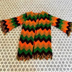 Fringe Long Sleeve Cardigan For Festivals, Vintage Multicolor Cardigan For Fall, Multicolor Long Sleeve Outerwear With Tassels, Vintage Orange Sweater For Fall, Bohemian Multicolor Fringe Cardigan, Bohemian Multicolor Fringed Cardigan, Vintage Multicolor Cardigan For Festivals, Vintage Multicolor Festival Cardigan, Vintage Fall Festival Cardigan