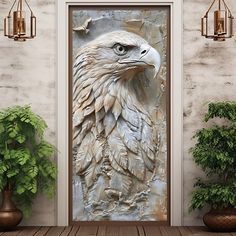 an eagle painting on the side of a door next to potted plants and vases