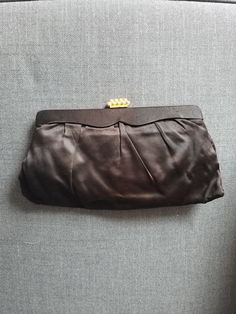 "Very cute black evening bag. This purse still has the original matching coin purse and mirror! Very lovely satin with a pink lining. Bug enough to hold a large modern smartphone and the essentials! Has a gold clasp. Label reads, \"Beau Sac\" I believe. Good vintage condition, interior lining has some stains, see photos. Exterior is in very good shape." Elegant Black Pouch Coin Purse, Elegant Black Pouch-style Coin Purse, Black Evening Coin Purse Clutch, Black Clutch Coin Purse For Evening, Formal Black Pouch Coin Purse, Formal Black Coin Purse, Classic Pouch Evening Bag For Party, Black Formal Clutch Coin Purse, Black Clutch Coin Purse For Formal Occasions