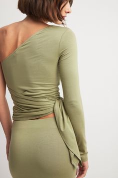 Soft Line Tie Top Fitted Green One Shoulder Top, Green Stretch Off-shoulder Top, Green Fitted Top With Asymmetrical Neckline, Green Fitted Tops With Asymmetrical Neckline, Green Fitted One-shoulder Top, Fitted Green One-shoulder Top, Green Stretch Asymmetrical Top, Green Asymmetrical Stretch Top, Asymmetrical Green Stretch Top