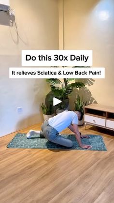 a man is doing yoga on a mat in front of a tv screen with the words do this 30x daily