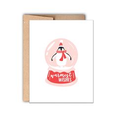 a greeting card with an image of a snow globe